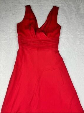 H Tommy Hilfiger 100% Silk Dress. Coral color. Size 6. Excellent condition.